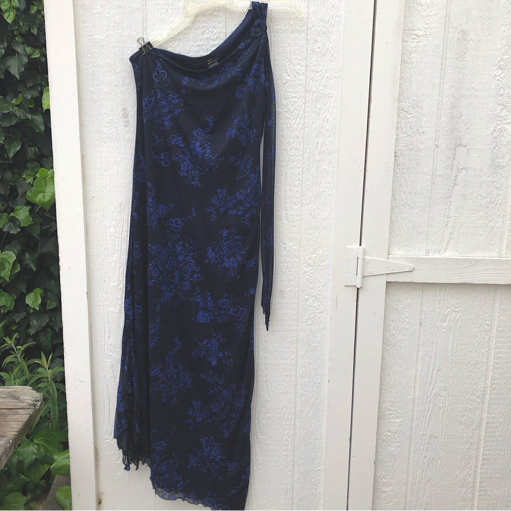 Glamorous one-shoulder beaded evening gown.